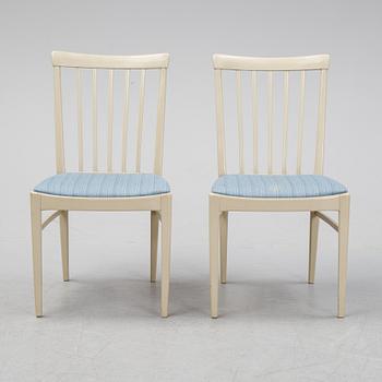 A dining table with six chairs by Carl Malmsten, second half of the 20th Century.