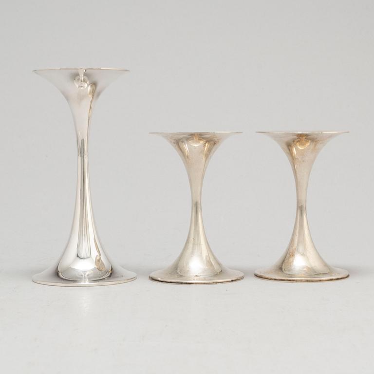 TAPIO WIRKKALA, three 'Trumpetti' silver candlesticks from Kultakeskus Oy, Hämeenlinna, Finland, 1974-93.