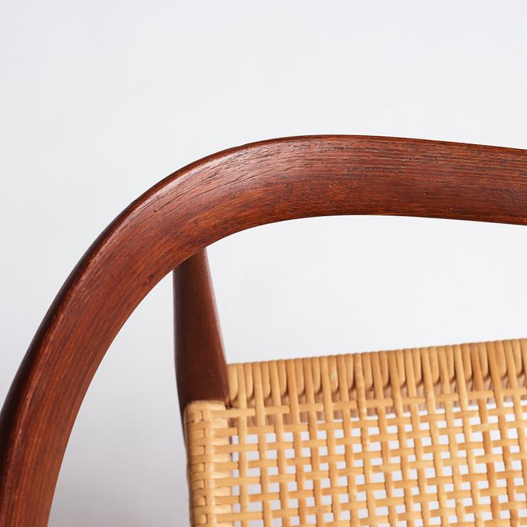 Nanna Ditzel, a pair of teak and rattan model 113 chairs, Poul Kold Savverk, Denmark, post 1955.