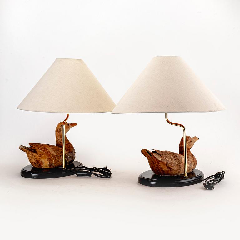 A similar pair of wood and brass table lamps from the later part of the 20th century.