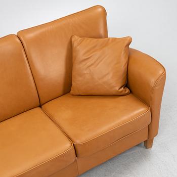 A 'Fia' leather upholstered sofa from Brunstad, 21st Century.
