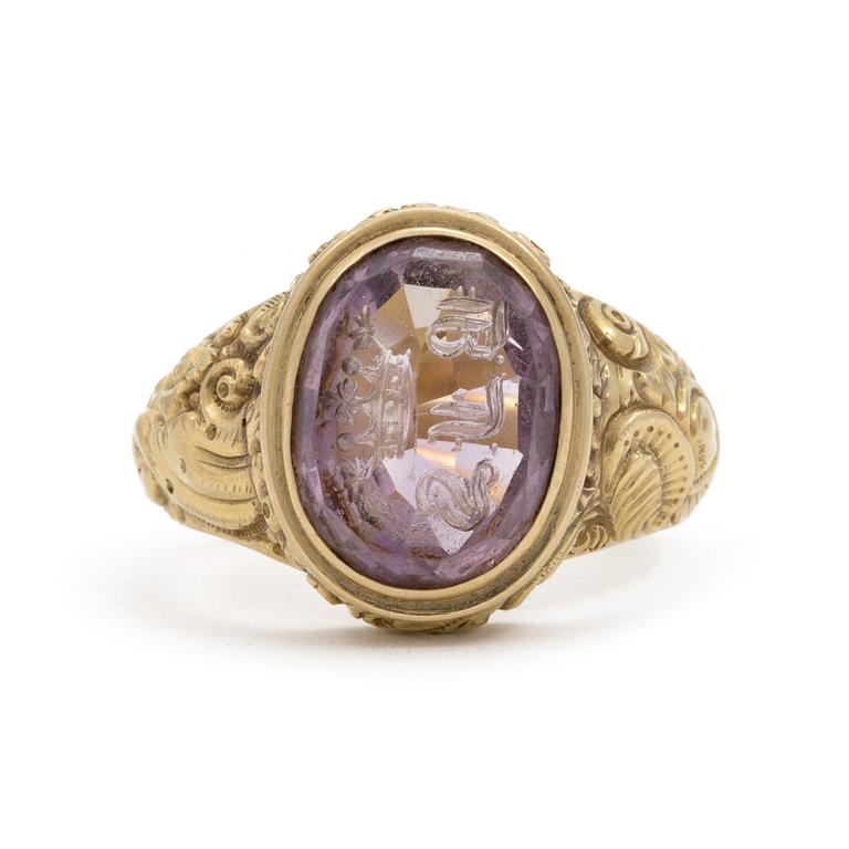 A signet ring set with amethyst.