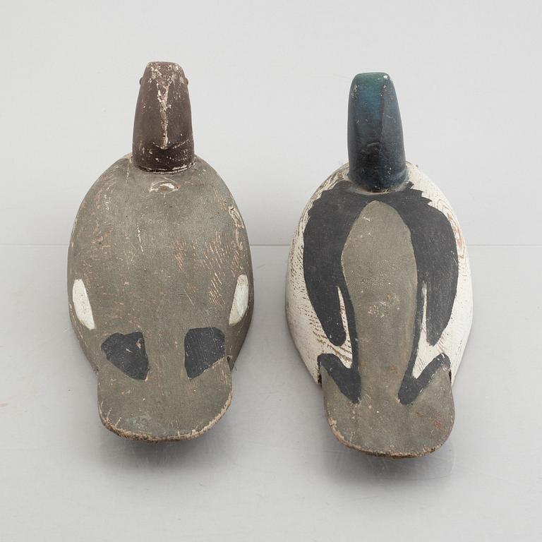 A pair of wood duck decoys, 20th century.