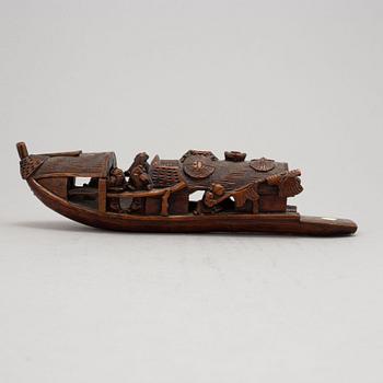 A Chinese bamboo sculpture of a boat, 20th Century.