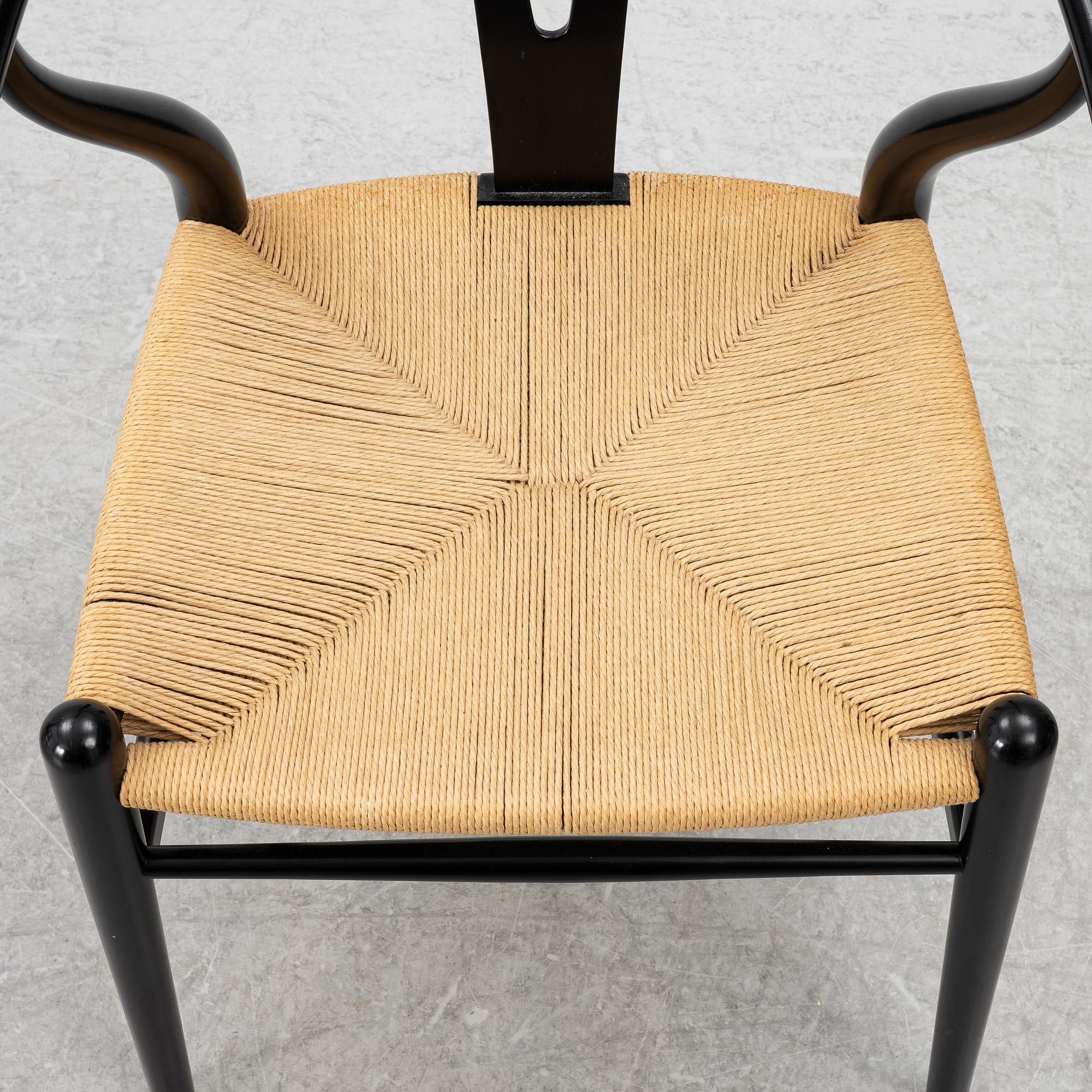 Hans J. Wegner, four CH24/ "Wishbone" chairs, Carl Hansen & Son, Denmark, 21st century.