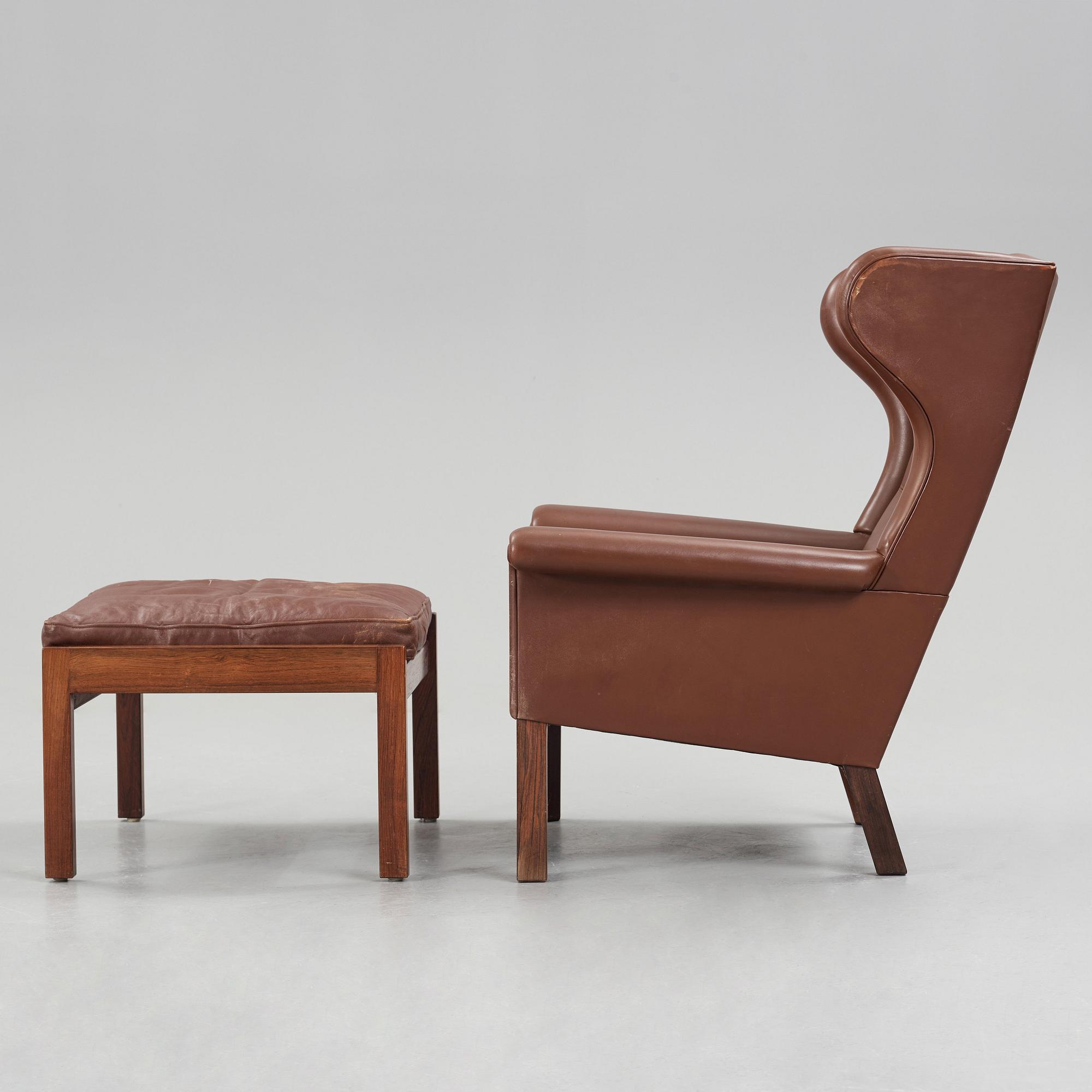 Hans J. Wegner, a pair of "AP-65" easy chairs with stools, AP-stolen, Denmark 1960's.