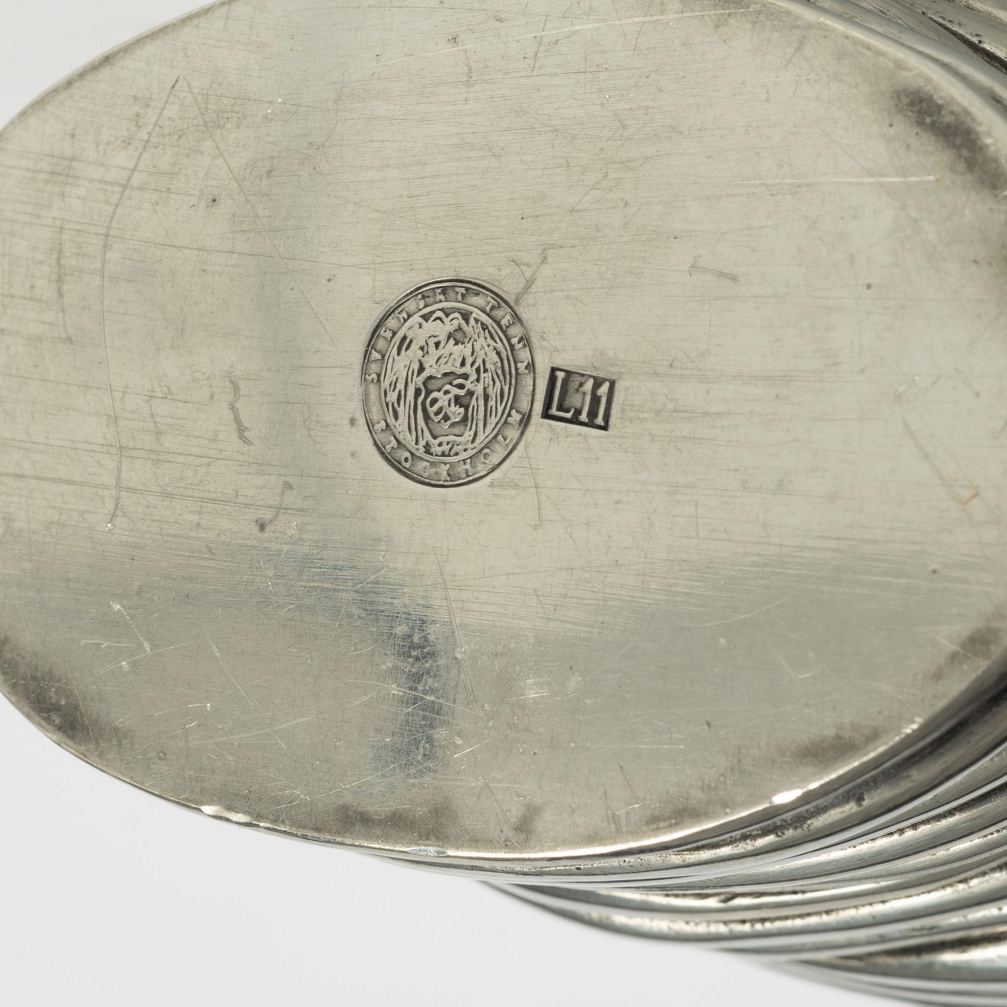 Annika Jarring, a pewter vase, "Randig", Svenskt Tenn, Stockholm 2009.