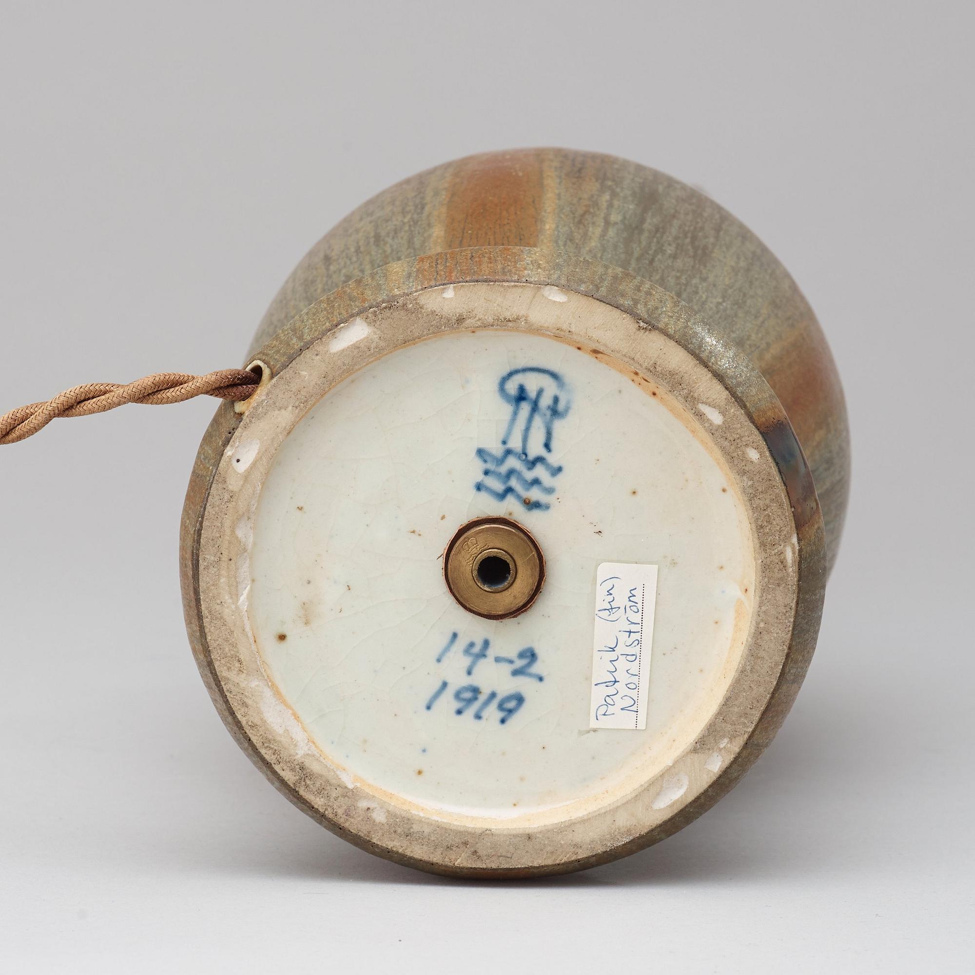 A Patrick Nordström stoneware table lamp with patinated brass mounts, Royal Copenhagen, Denmark 1919.