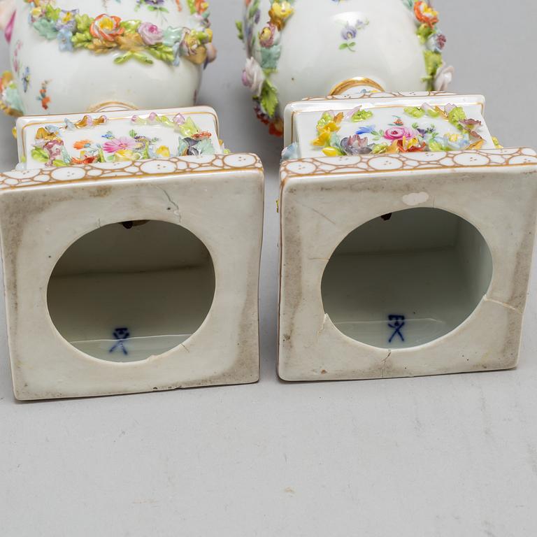 A pair of 19th century lidded vases, porcelain, Germany.