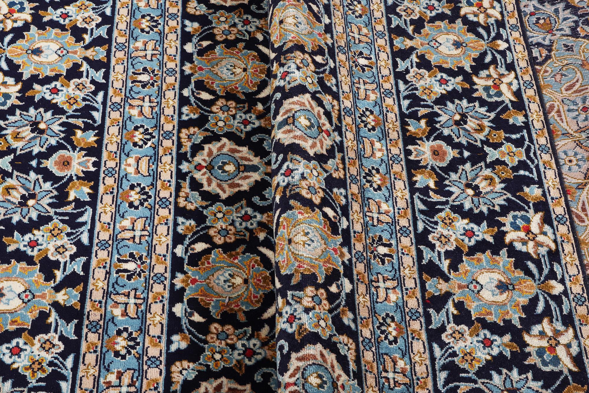 A carpet, Kashan, ca 391 x 286 cm.