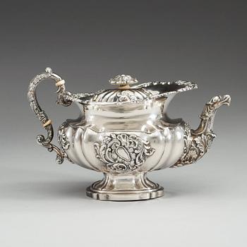 A Russian 19th century parcel-gilt tea-jug, makers mark of Alexander Korder, St. Petersburg 1840.