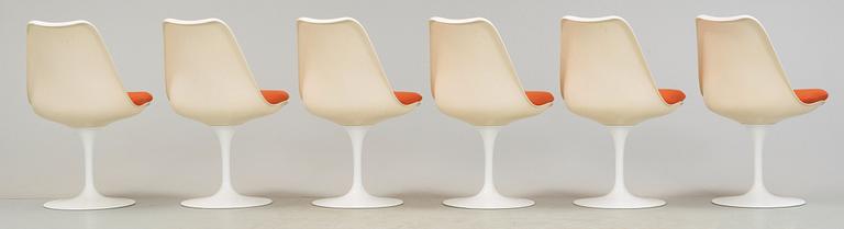 An Eero Saarinen 'Tulip' marble top table and six chairs, Knoll International.