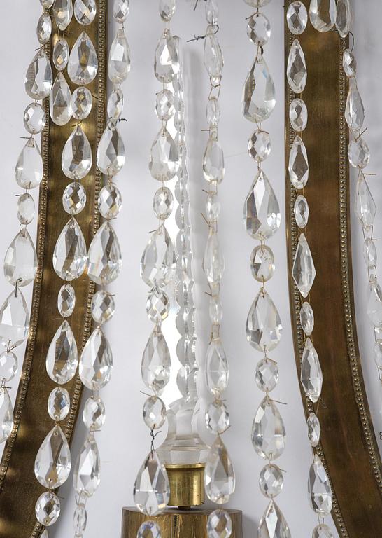 A pair of Russian Louis XVI-style  four-branch gilt bronze appliques, 19th century.
