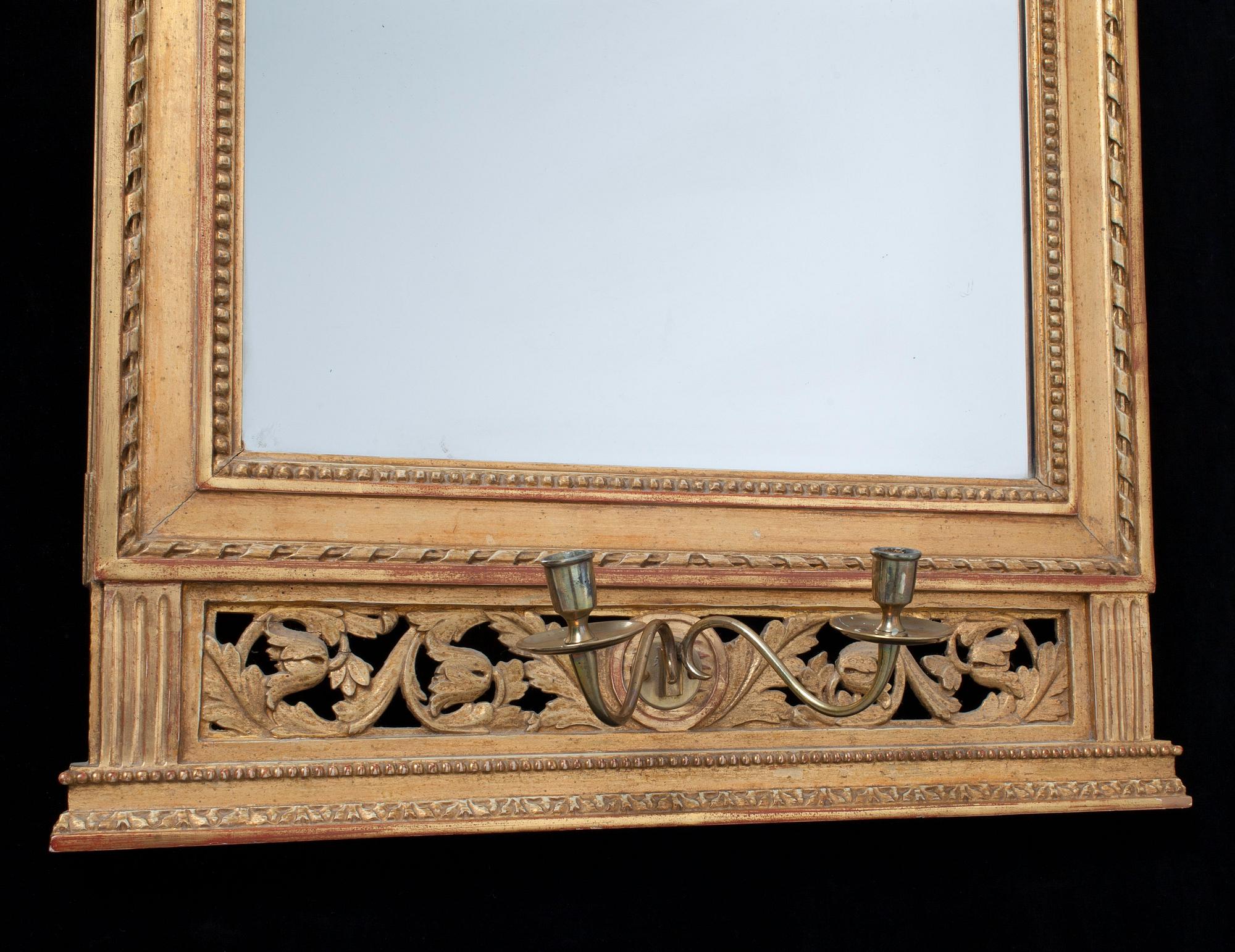 A pair of Gustavian two-light girandole mirrors by Lago Lundén, signed and dated 1789.