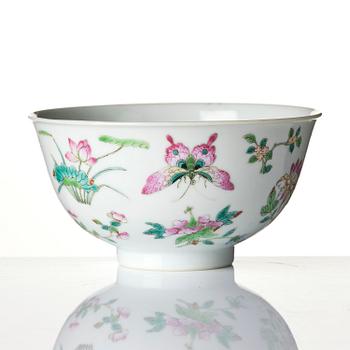 A famille rose 'butterfly' bowl, Qing dynasty with Daoguang mark and of the period (1820-1850).