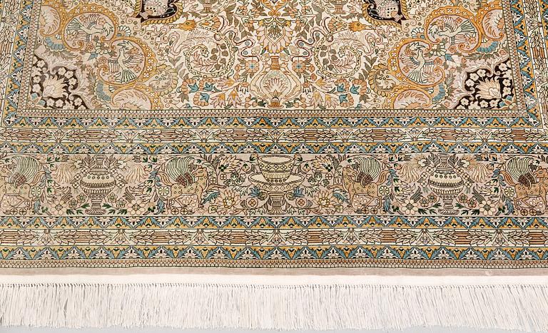 A pictoral orientalisk rug, ca 246 x 156 cm.