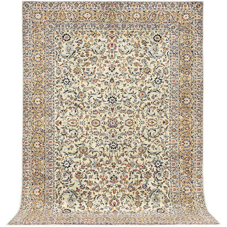 A Kashan carpet a. 380 x 260 cm.