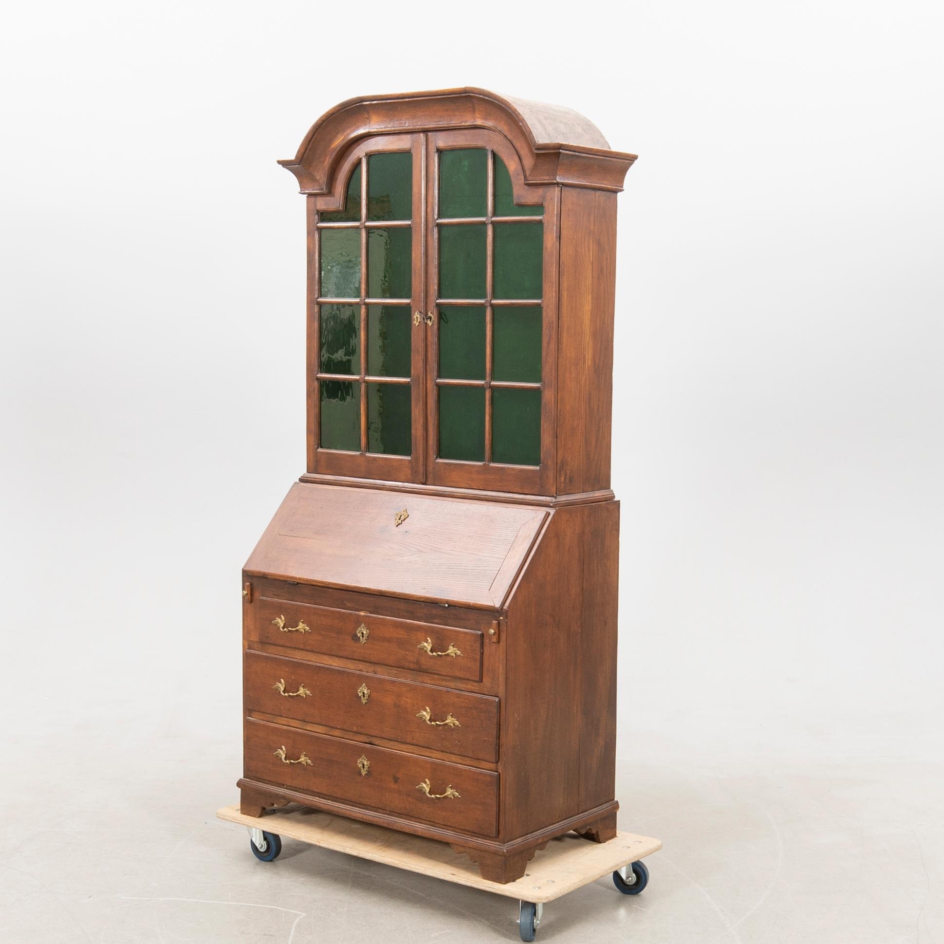 Slant-front secretary with a glazed section, 18th century.