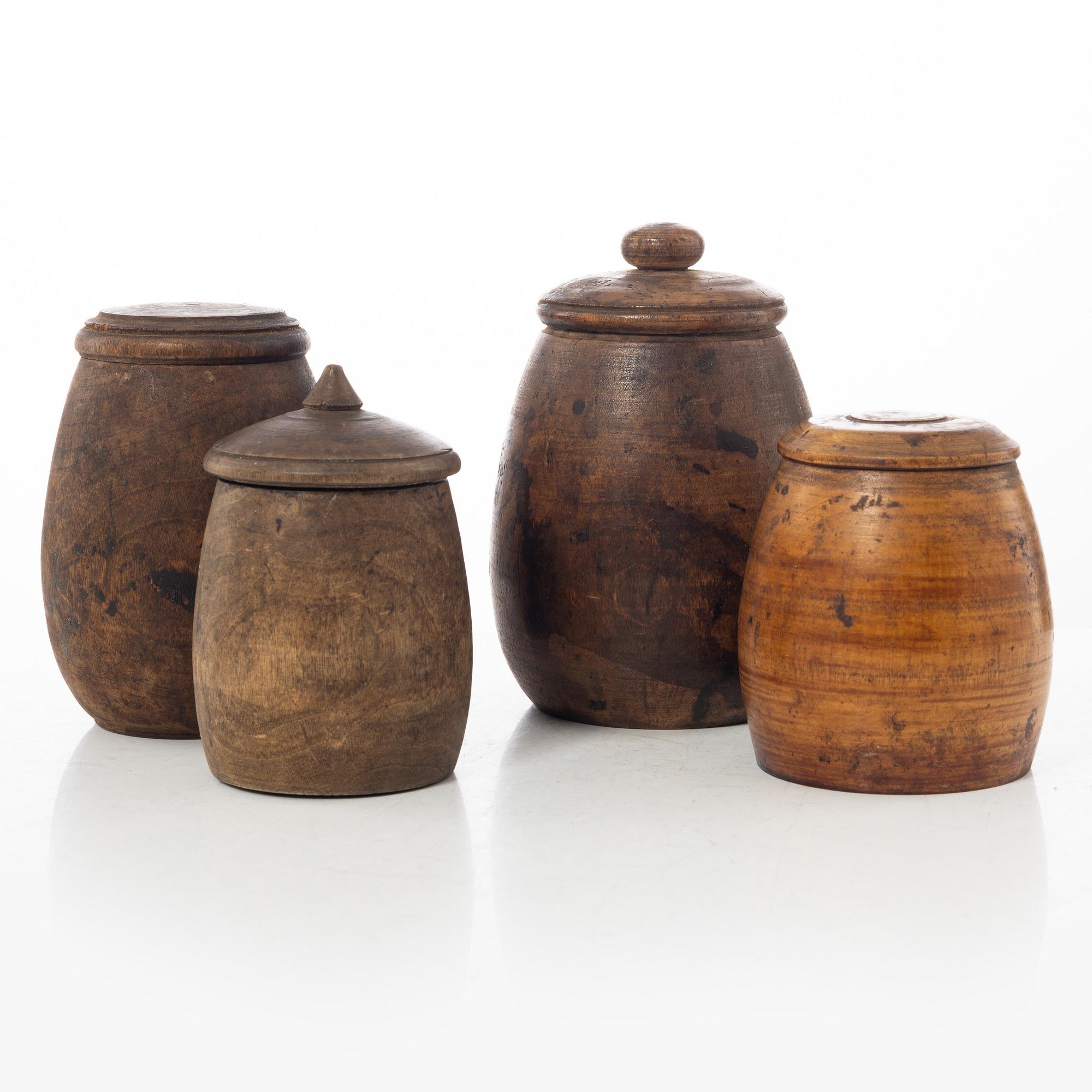 A set of four turned folk art jars, 19th century.