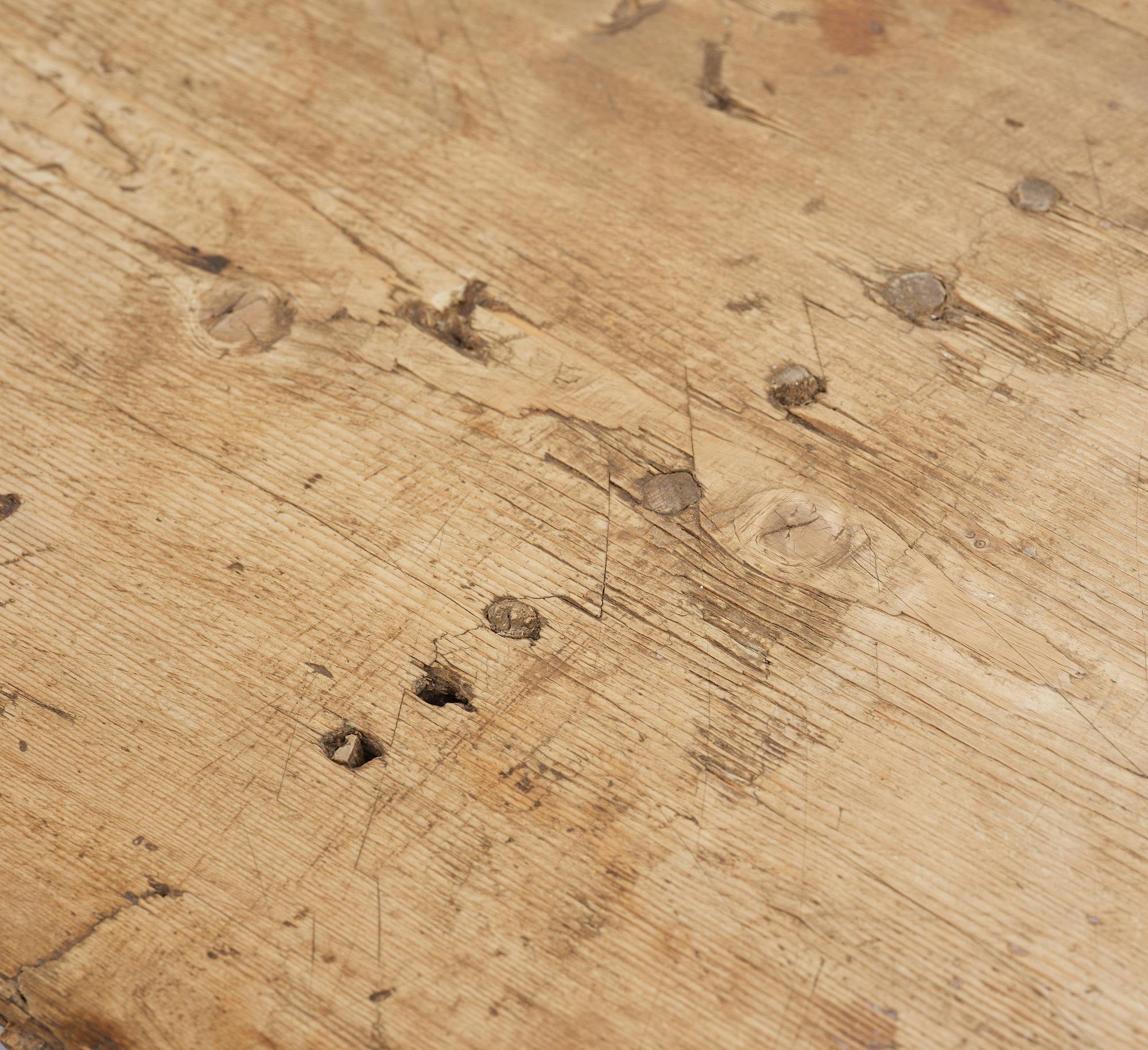 A pine trestle table, 20th century incorporating older elements.