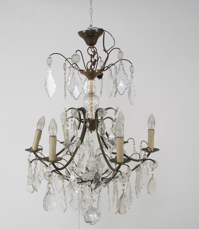 LJUSKRONA, rokokostil. H 80.
Proveniens: Git Gay.