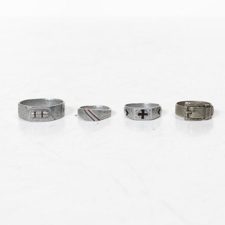 An aluminium bucket, a wooden case, four rings and two miniature knives, Finland and Russia, early 1900s.