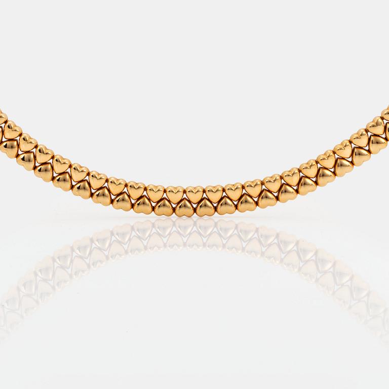 A Cartier necklace "Double Hearts" in 18K gold.