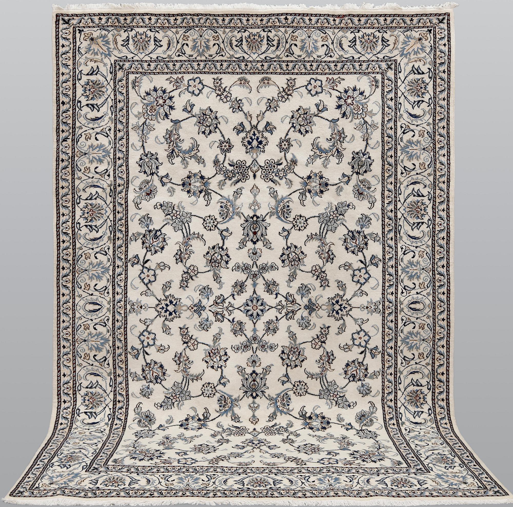 A part silk Nain carpet, ca 305 x 198 cm.