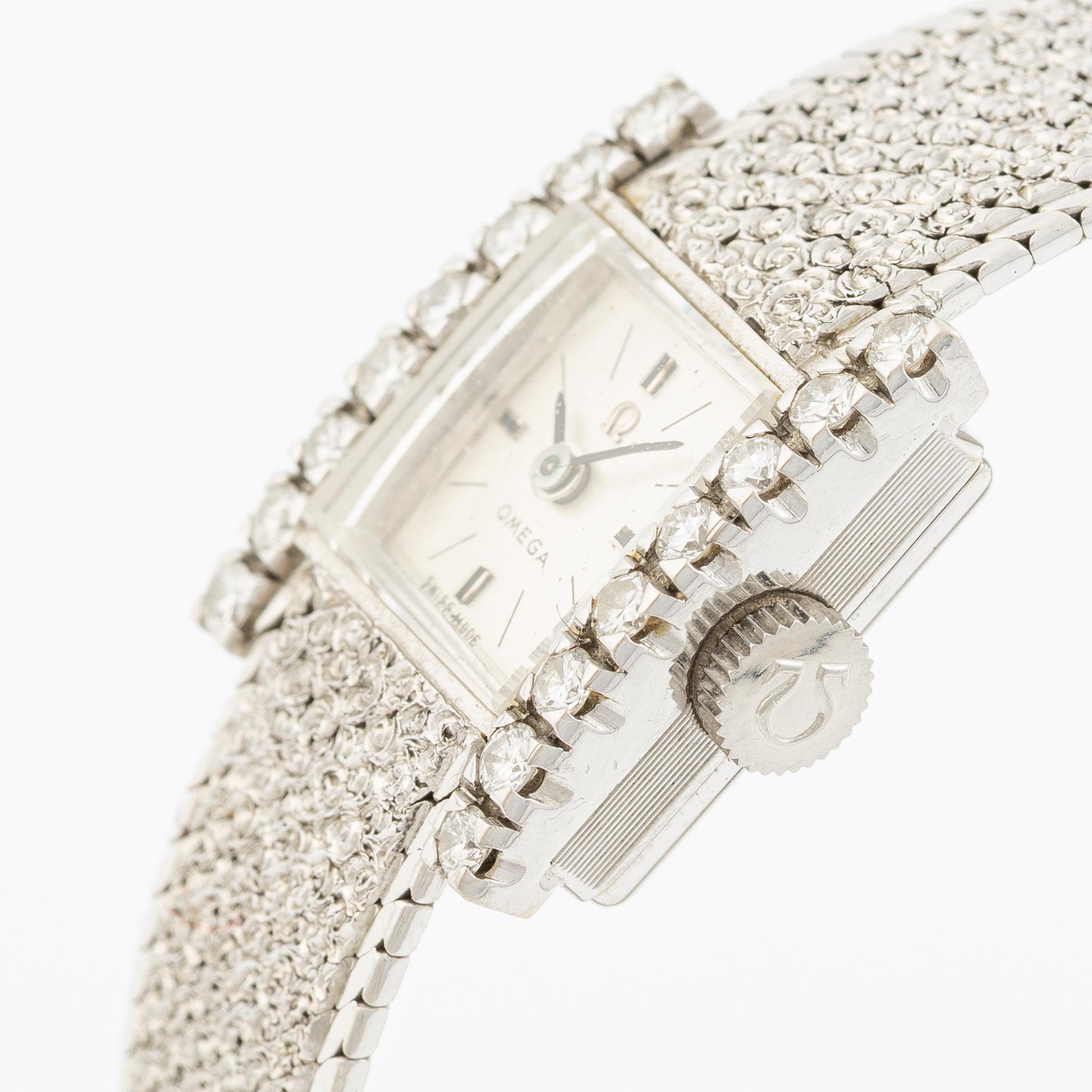 Omega, armbandsur, 14 x 17 mm.