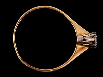 RING, 18k guld och vitguld med briljantslipad diamant, 0.24 ct,  Kaplans, Stockholm, 1990. Vikt 2 g.
