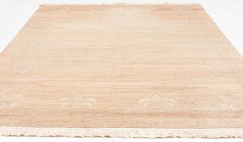 A Chinese carpet, c. 330 x 270 cm.