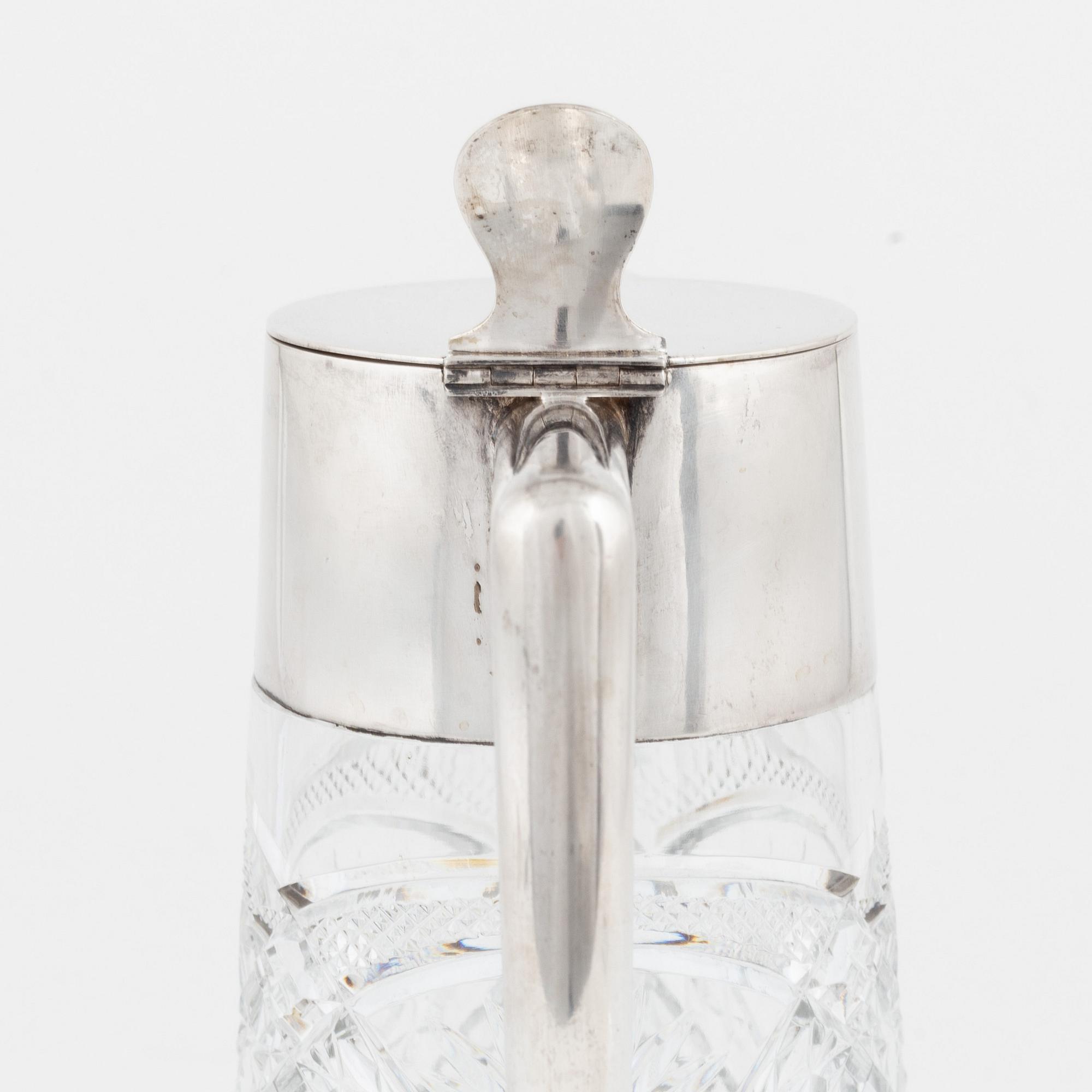 CG Hallberg, a silver and glass flagon, Stockholm 1918.