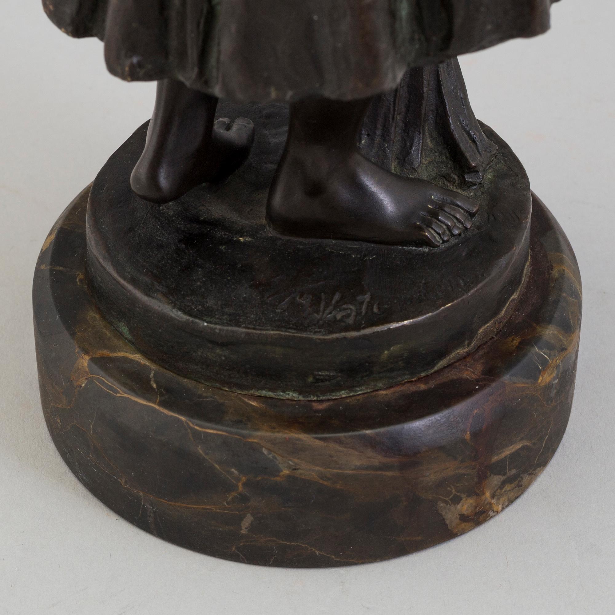 A SCULPTURE, after Max Valentin, signed M. Valentin,