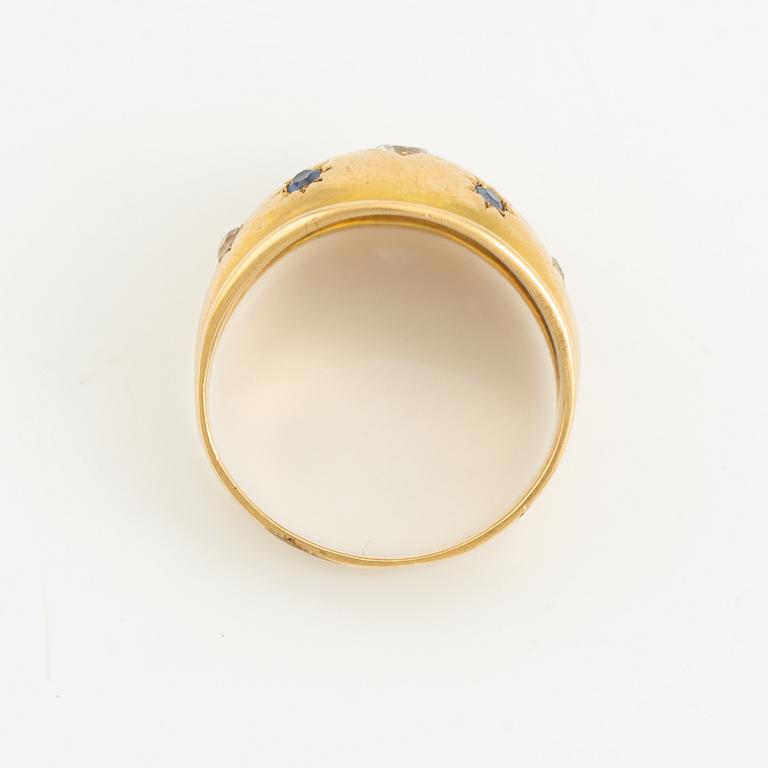 Ring 18K gold with sapphires and white stones.