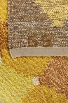 A flat weave carpet, signed GS, c. 205 x 139 cm.