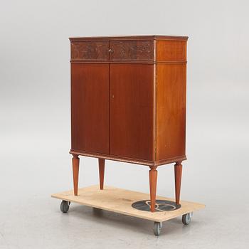 A cabinet, mid 20th Century.