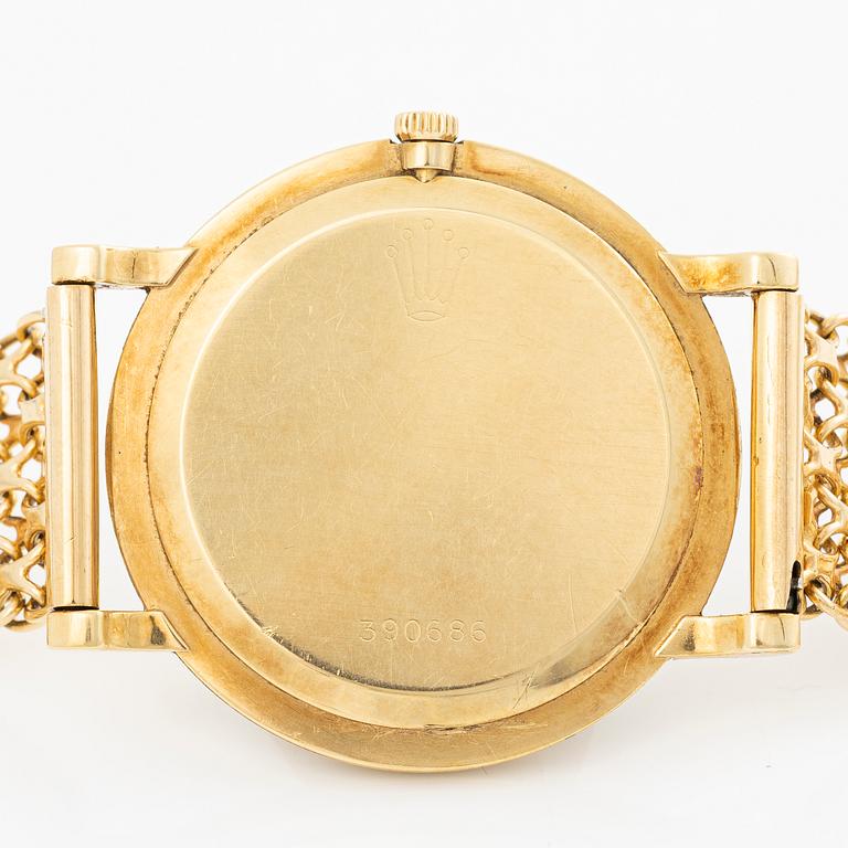 Rolex, 18K gold, with an 18K gold bracelet, wristwatch, 31.5 mm.