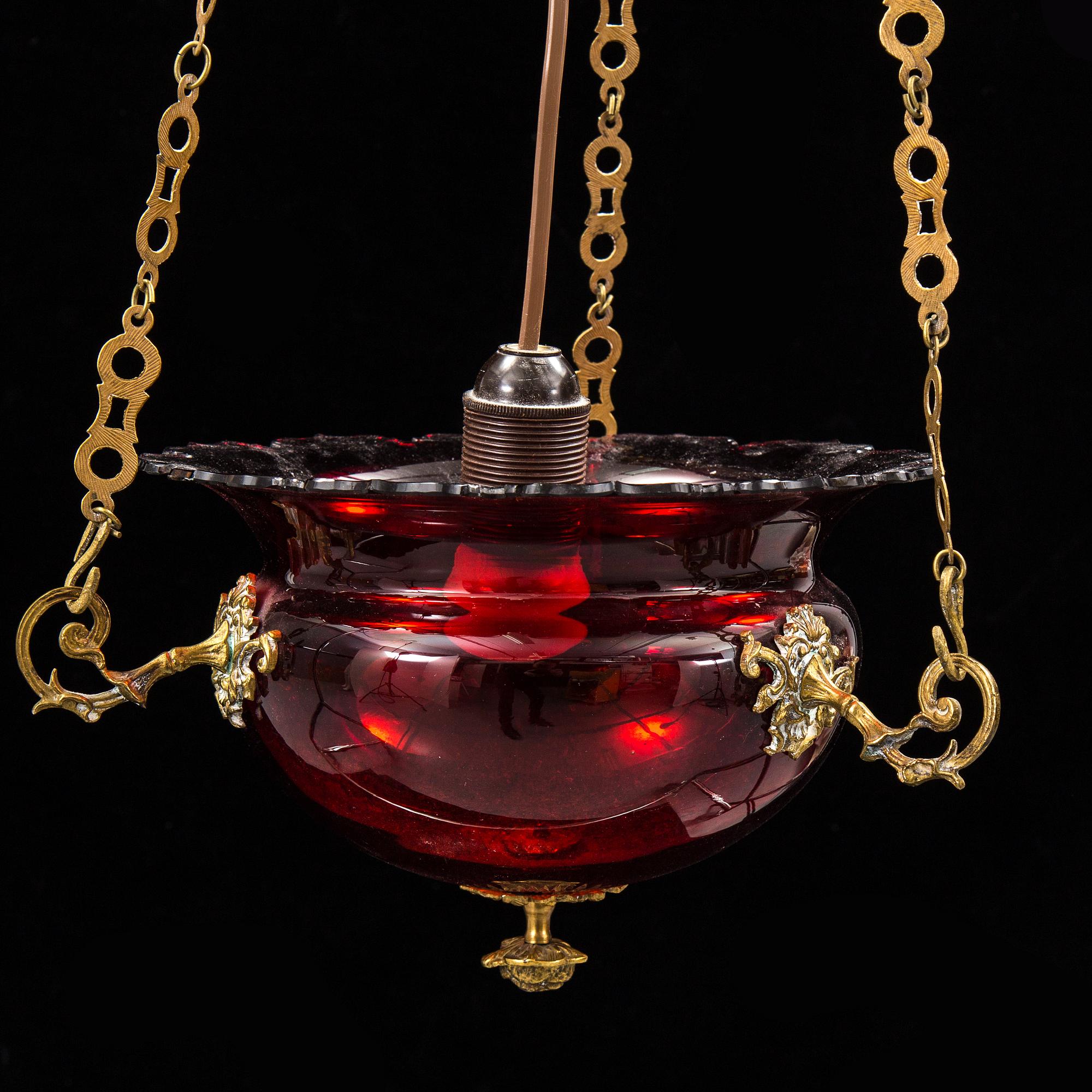 A red glass hanging lamp, second half of the 19th century.