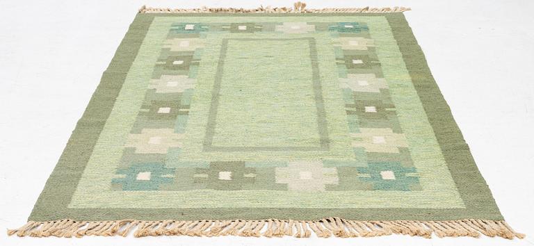 A 1960s flatweave carpet, c 203 x 134.5 cm.