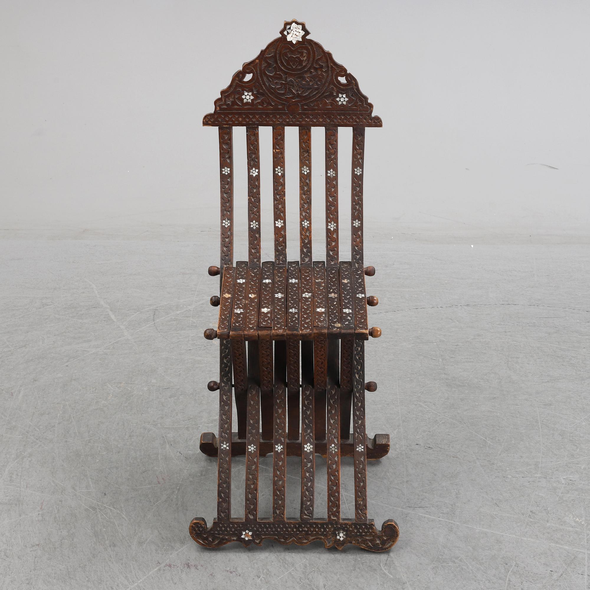An early 20th century folding chair from the ottoman empire.
