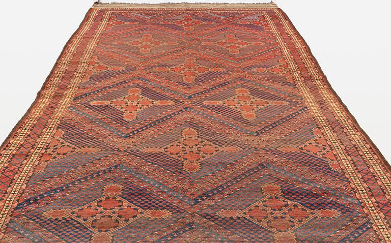 An antique Beshir carpet, c 495 x 206 cm, around the year 1875.