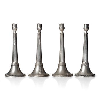 90. A set of four Swedish late Gustavian pewter candlesticks by E P Krietz, made in Stockholm.