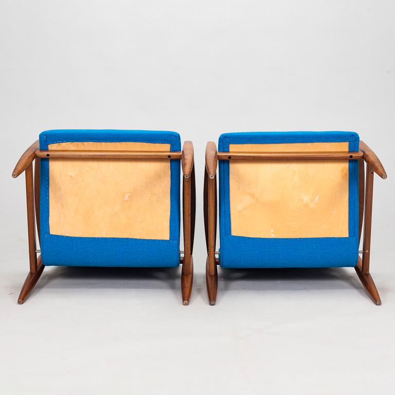 A pair of 1950's armchairs.