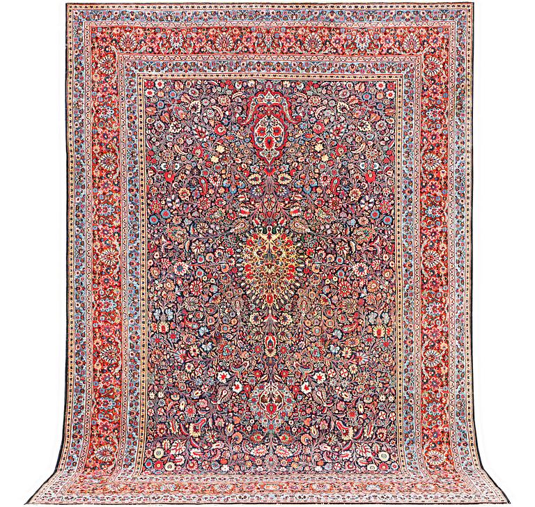 A semi-antique Meshad carpet, a. 360 x 252 cm.