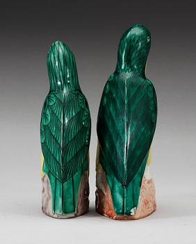 A set of two green and yellow glazed parrots, Qing dynasty, Jiaqing (1796-1820).