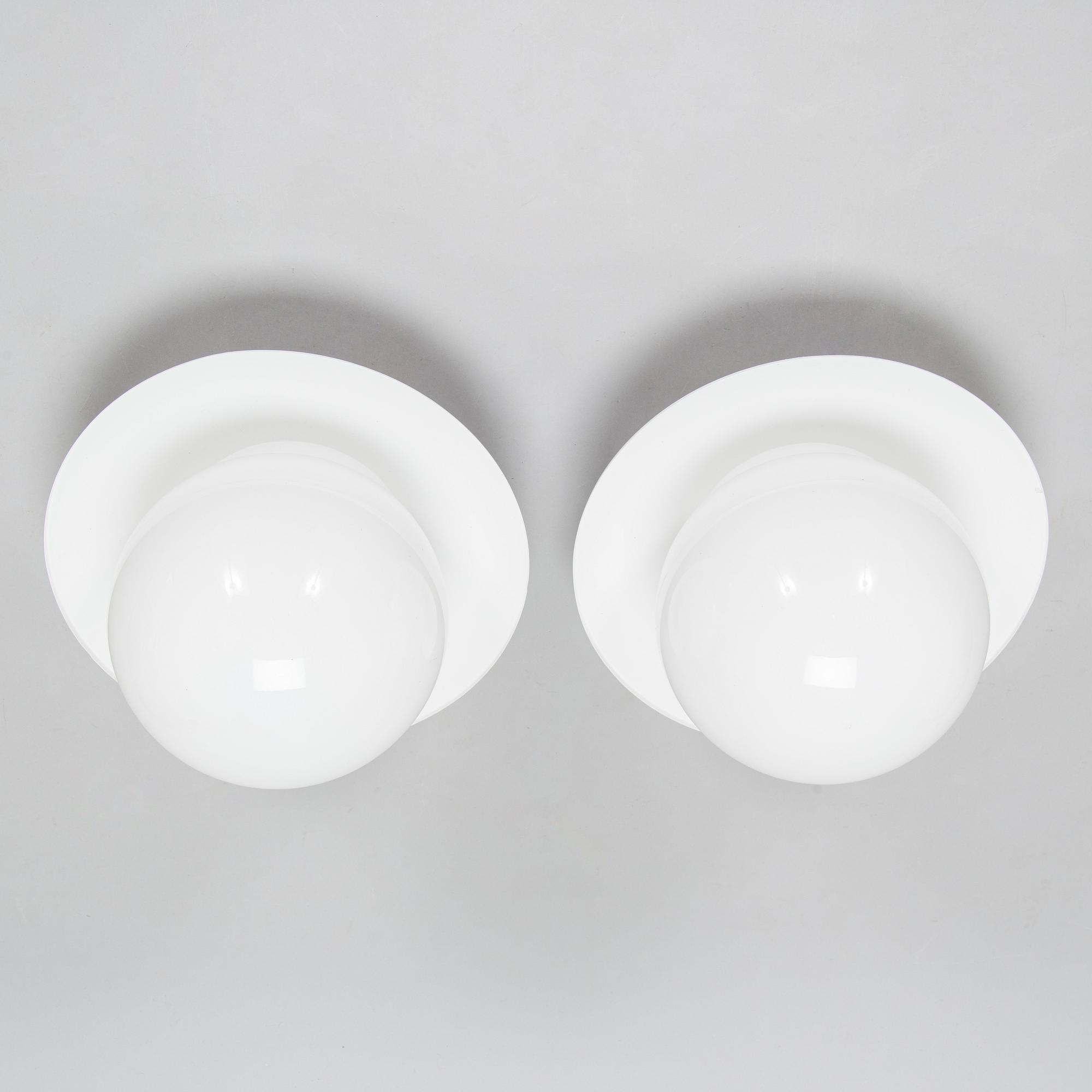 Paavo Tynell, a pair of mid-20th century outdoor  wall lamps for Idman Finland.