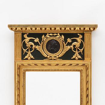 A Gustavian style mirror by W. Enelius, Linköping, Sweden, 20th century.