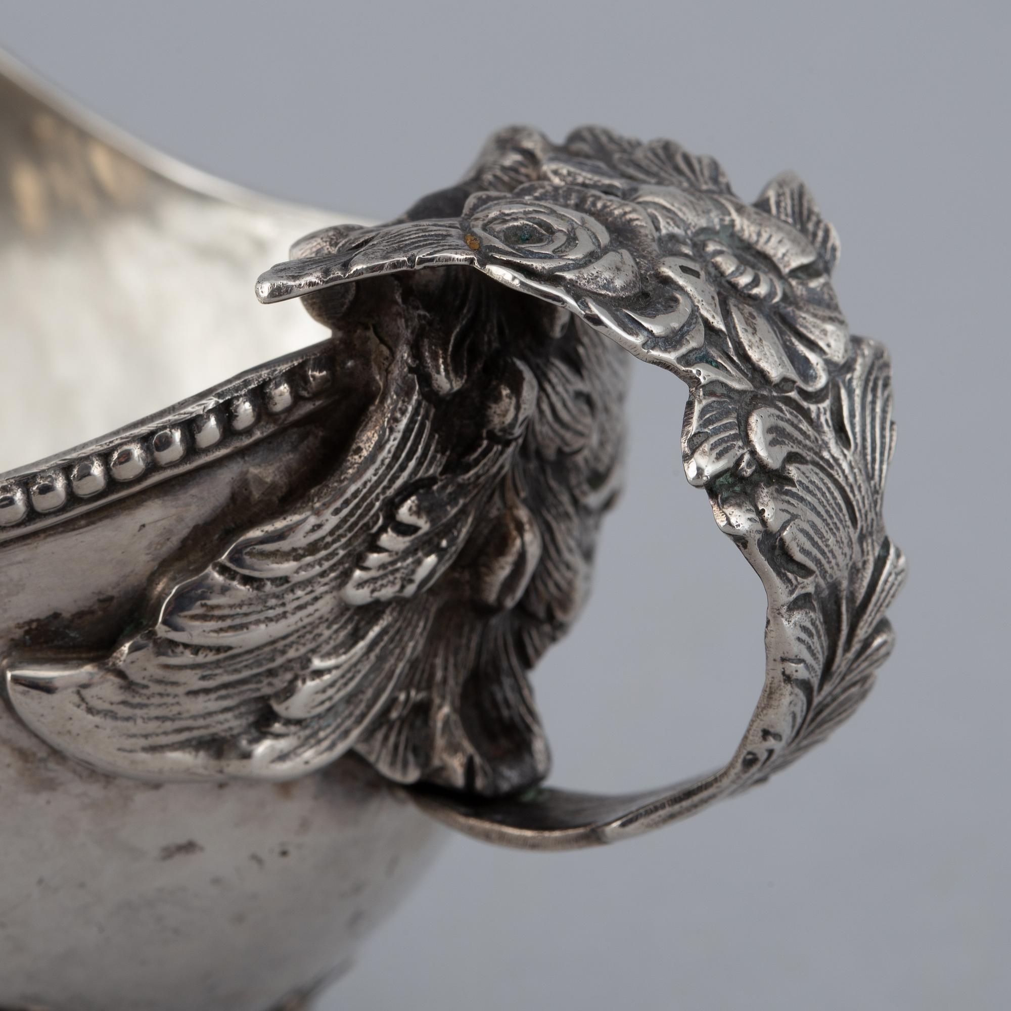 Two creamers, silver, one german and one Johan Petter Grönvall, Stockholm 1827.
