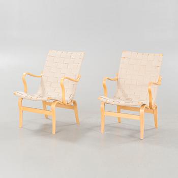 BRUNO MATHSSON, a pair of lounge chairs, model "Eva", late 20th century.