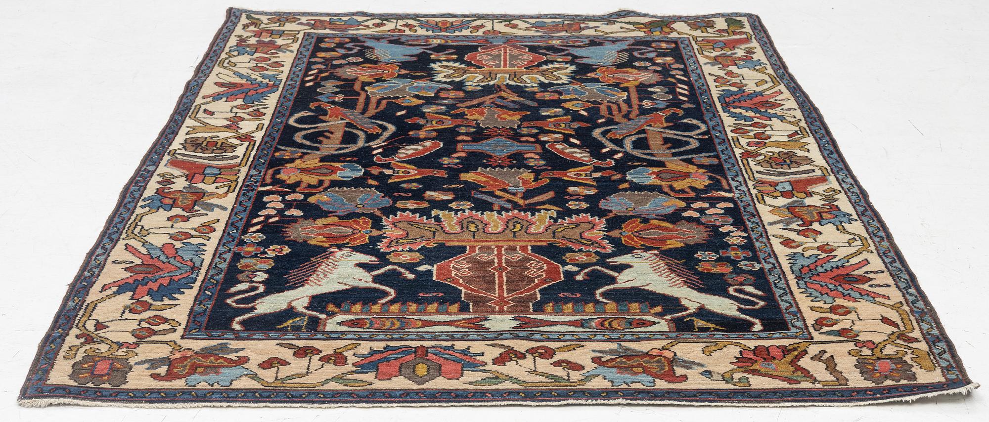 An antique Hamadan rug Northwest Persia (Iran), c. 190 x 140 cm.
